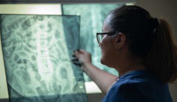 Tech reading x-rays