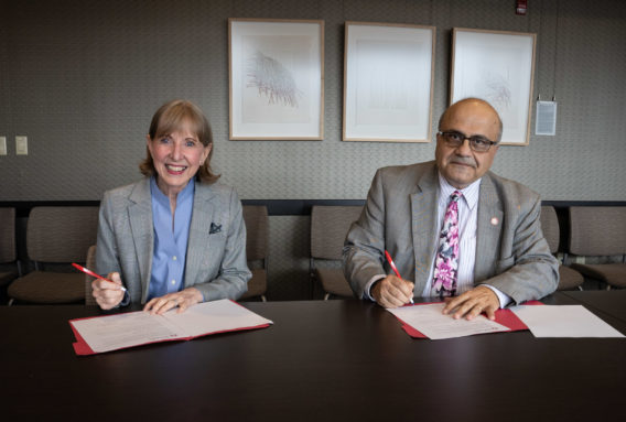 Dr. Johnson and Dr. Deeb sign MOU